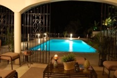 Pool 1 at Night from Patio Perspective